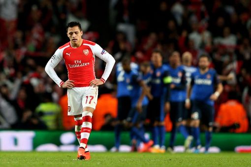 Alexis Sanchez trudges off after the Gunners just fall short of overturning the first leg deficit.