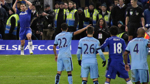 Chelsea's Branislav Ivanovic prepares to test out Manchester City's defences.